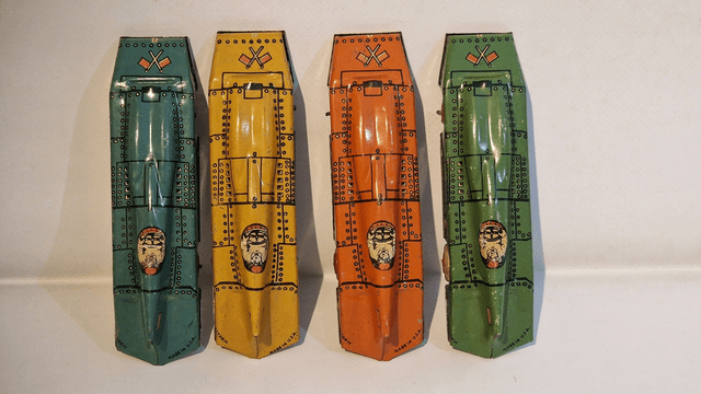 Rare tinplate mechanical speedway streamlined racers by Lindstorm