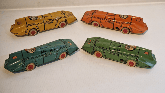 Rare tinplate mechanical speedway streamlined racers by Lindstorm